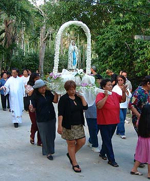 Carrying the statue