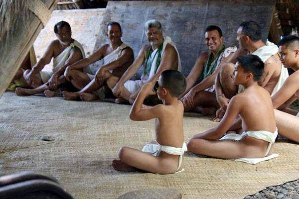 Boys drinking `awa