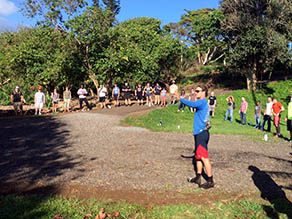 Keahi talking to volunteers